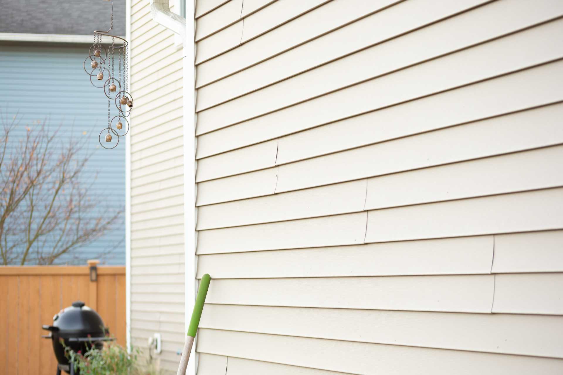 Underneath the Ripples: How Trapped Moisture and Substrate Decay Cause Siding to Buckle - Custom Aluminum